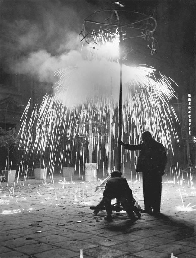 #15 Men lighting fireworks, Sicily, 1950s. (Mario De Biasi)