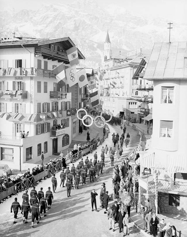 #19 The French team heading to the Ice Stadium for the opening ceremony of the 7th Olympic Winter Games, Cortina, 1956.