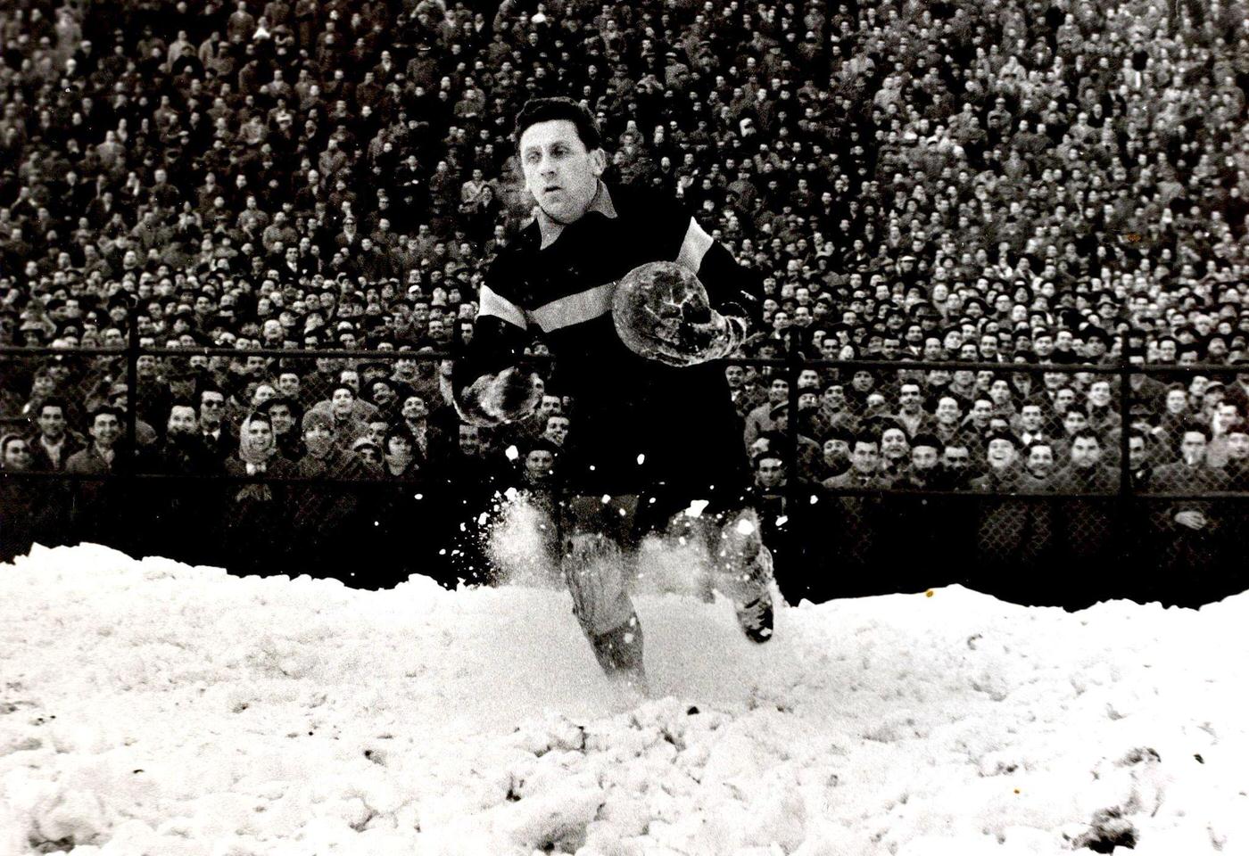 #32 Italy v France, A picture of the French goalkeeper Remetter as he retrieves the ball from the snow behind his goal