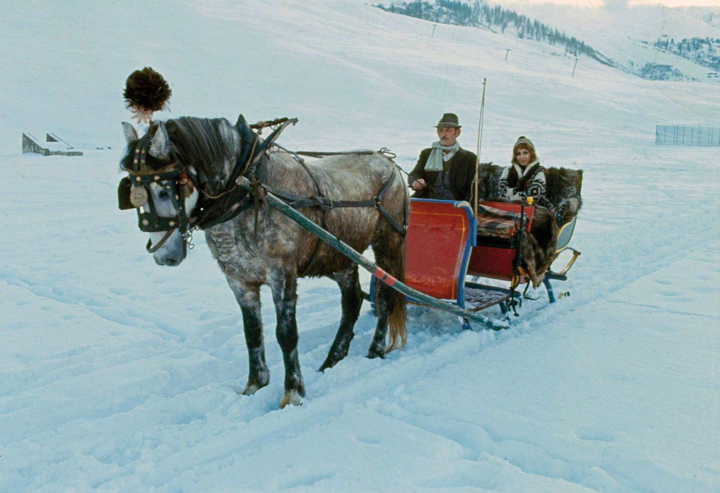 #43 The singer Mia Martini (Domenica Rita Adriana Bertè) on a horse-drawn sleigh. Livigno, Italy. 1973