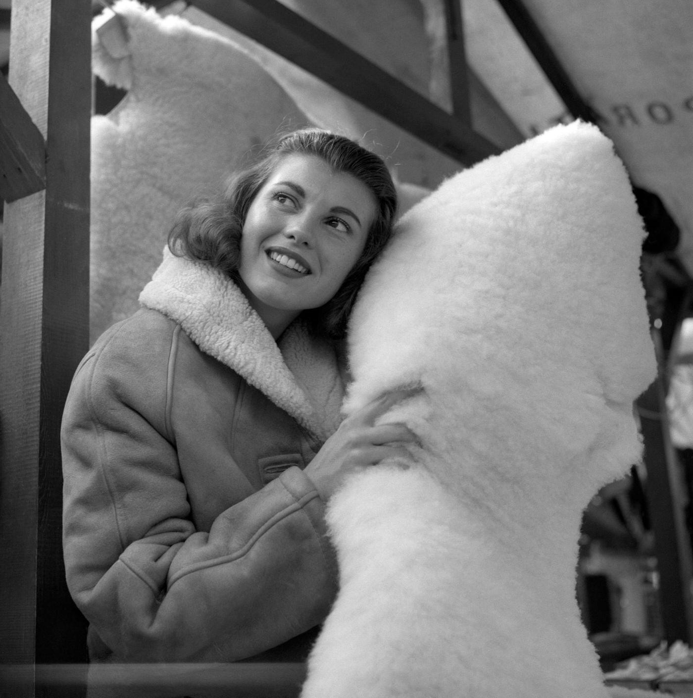 #12 Miss United Kingdom, 23 year old Hilda Fairclough, who is spending the winter selling sheepskins for her father in Morecambe Market.
