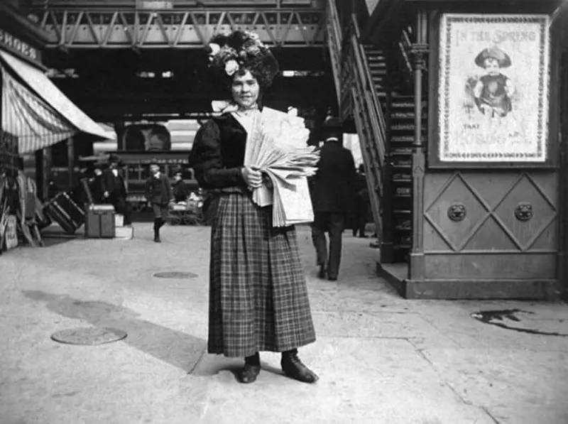 #19 Newspaper girl.