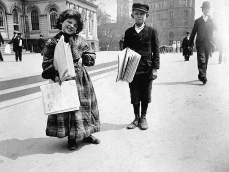 #22 Newsgirl and newsboy.
