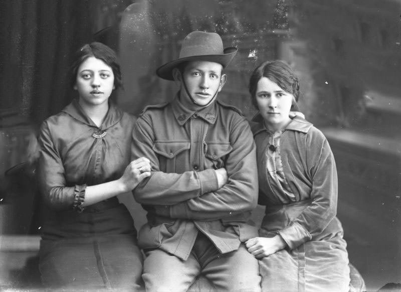Private James Germyn (1894-1922) and girls, WWI