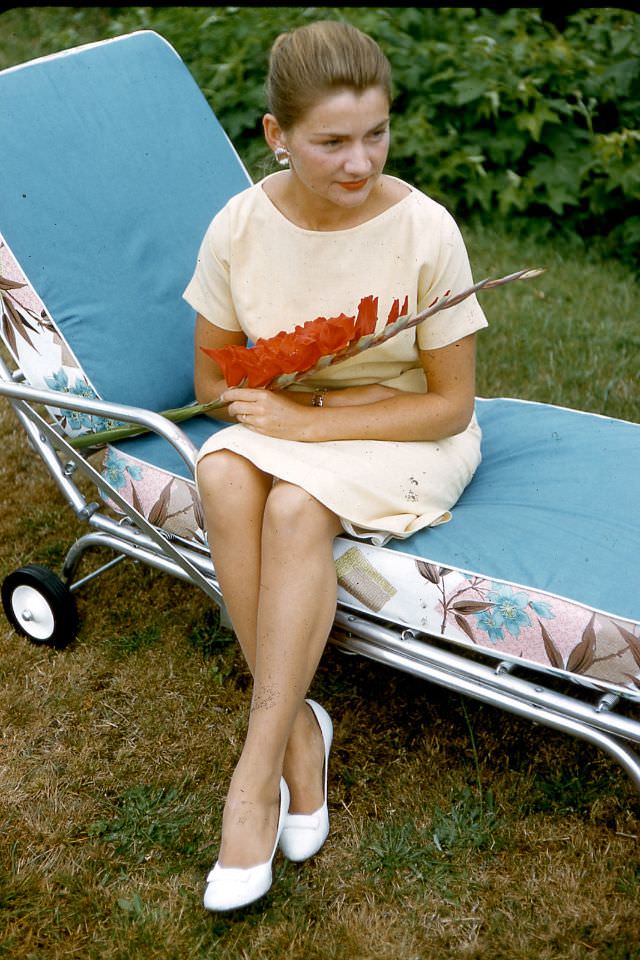 #15 Arlene Smith with gladiollas, 1959