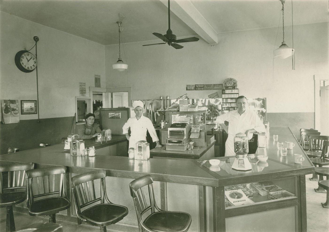 #97 Black and white photograph of staff posed in Earl’s Light House Restaurant