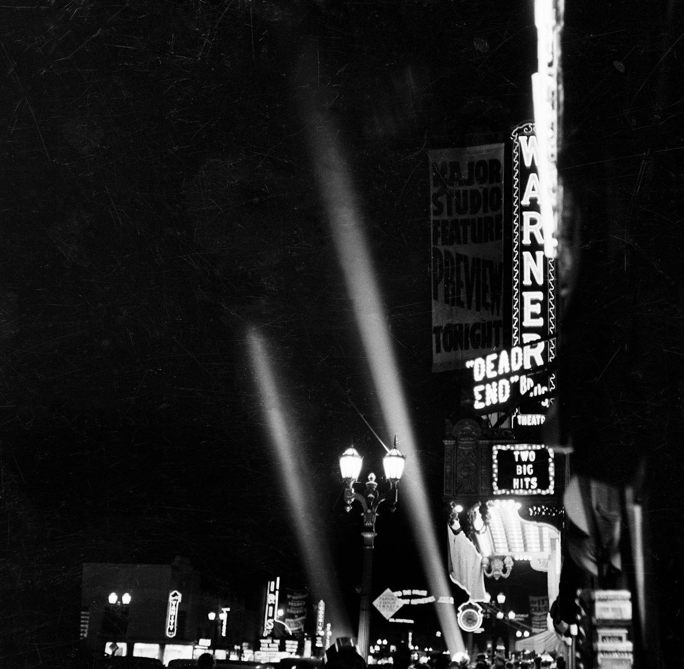 #100 A night view down Hollywood Boulevard in Los Angeles, California, 1937.