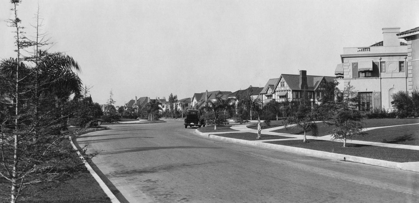 #115 A suburban boulevard in the Wilshire district of Los Angeles, California, 1930.