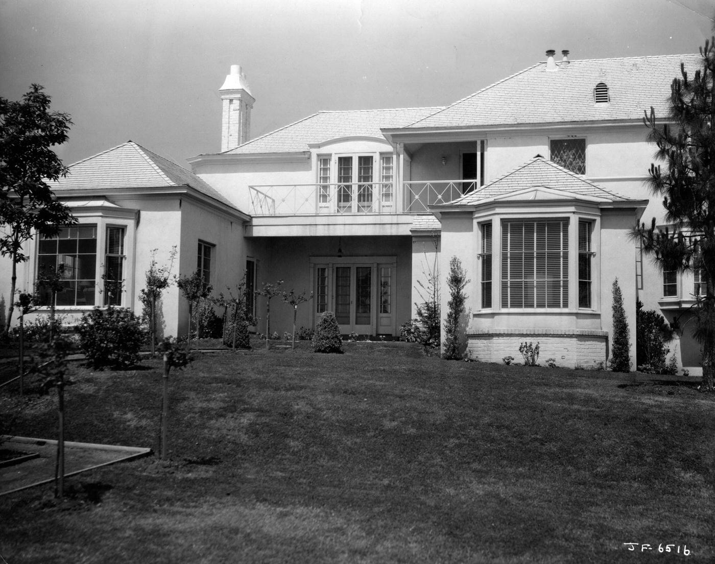 #22 An exterior shot of Joan Fontaine’s house in Hollywood, signed to RKO, 1930.