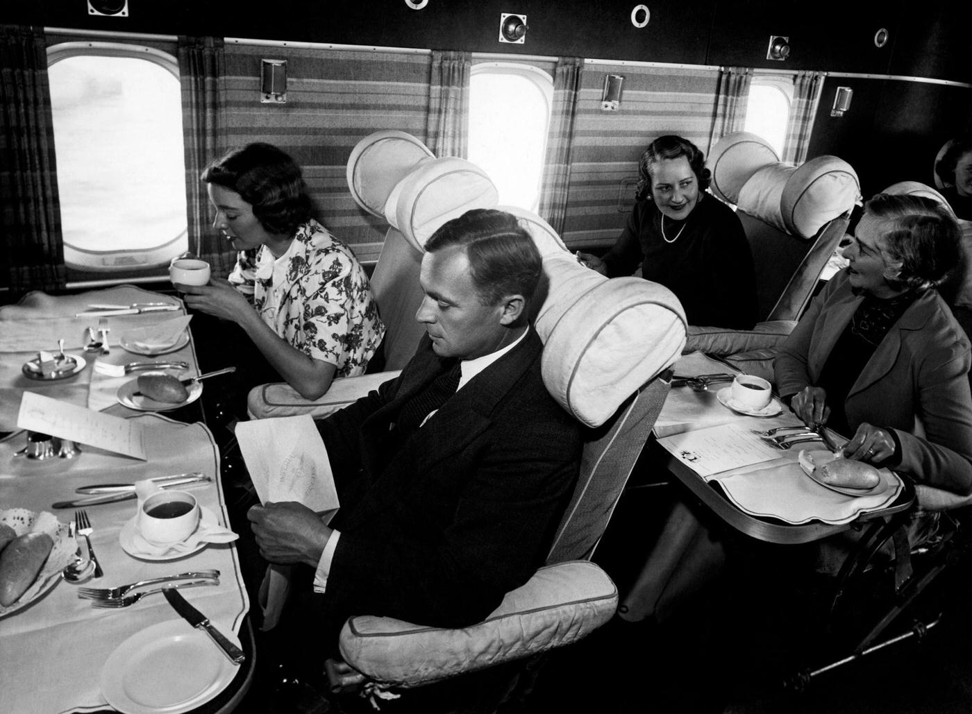 Passengers are seen dining on the Empire in 1940.