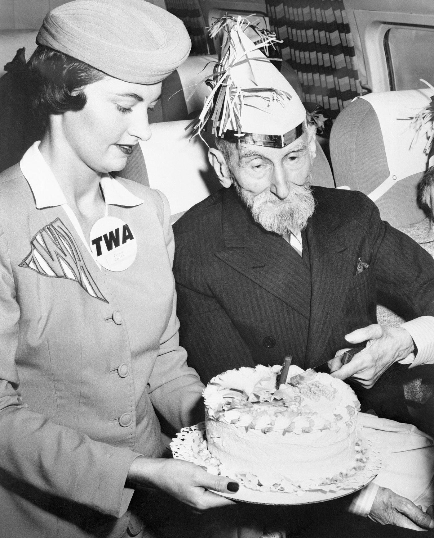 #73 Kentucky Colonel Ward Elmore, who is one of 25 people from the Laguna Honda Home in San Francisco, makes his first plane flight on August 22, 195?, and also celebrates his first 100 years.