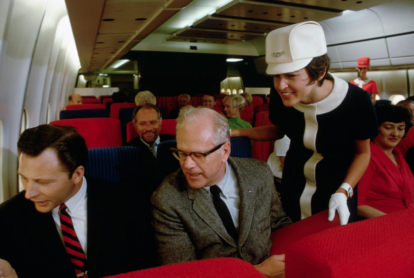 #45 Passengers aboard an airplane.