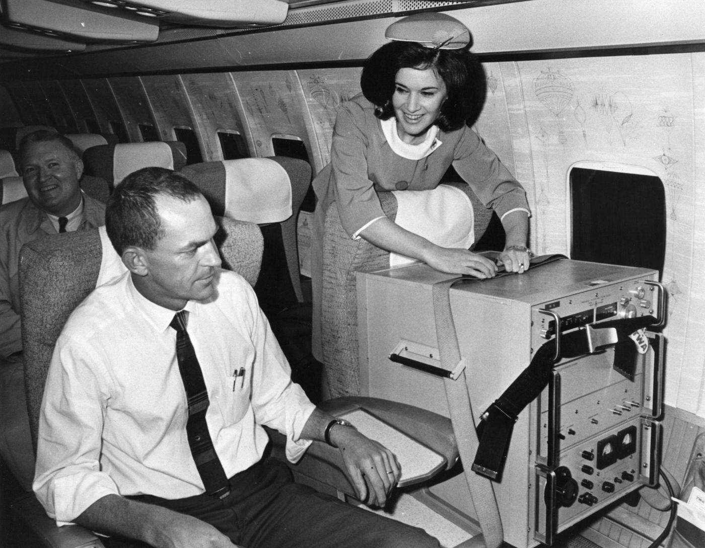 Two first-class seats aboard a TWA jet from London to Washington, one occupied by a caesium beam timepiece accurate to one-millioneth of a second used in the USA’s space programme. Date unspecified.