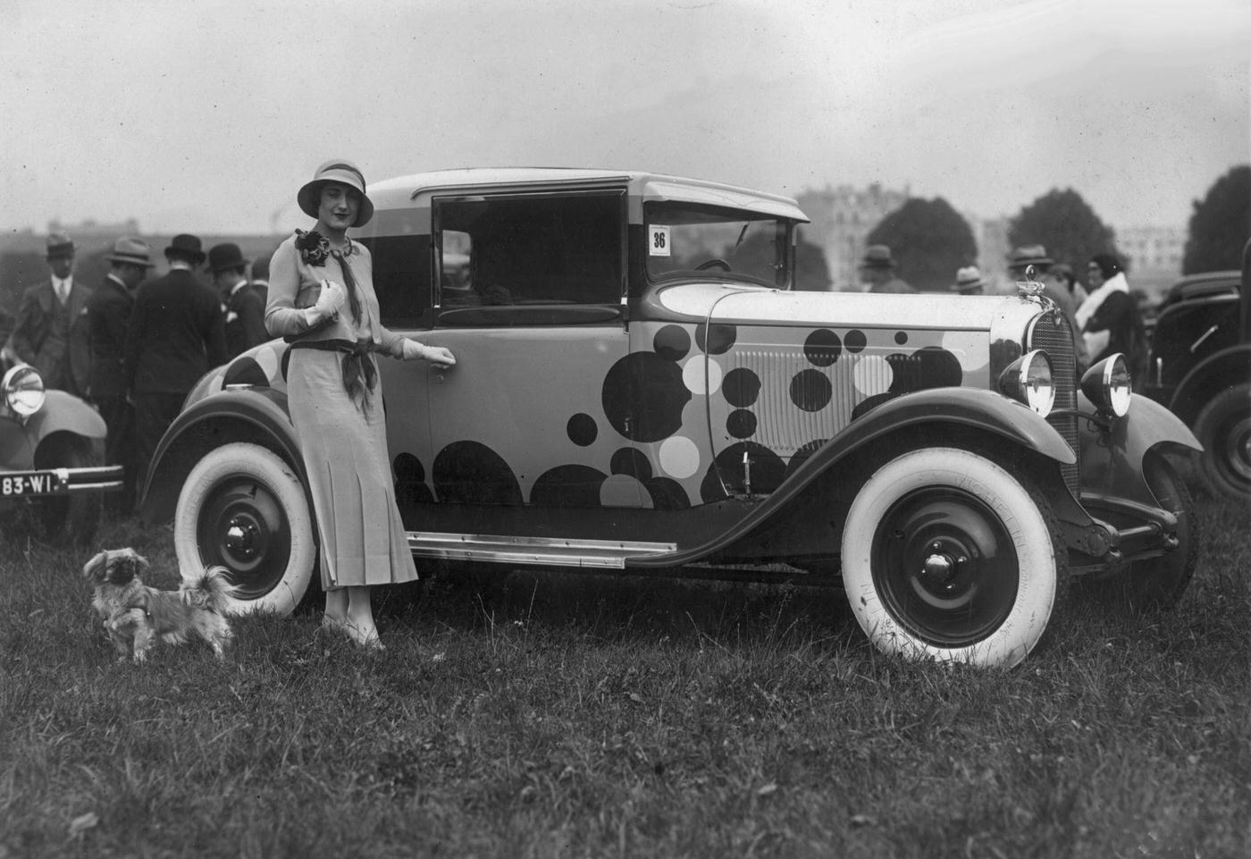 #81 Woman in Fashionable Dress Standing by Citroen Car with Dog, 1935.