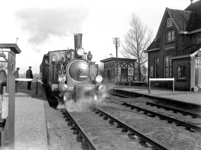 #12 The 7008 puffing in Bovenkerk. The train, again assembled according to the 1+1 standard, is on its way to Aalsmeer, February 22, 1950