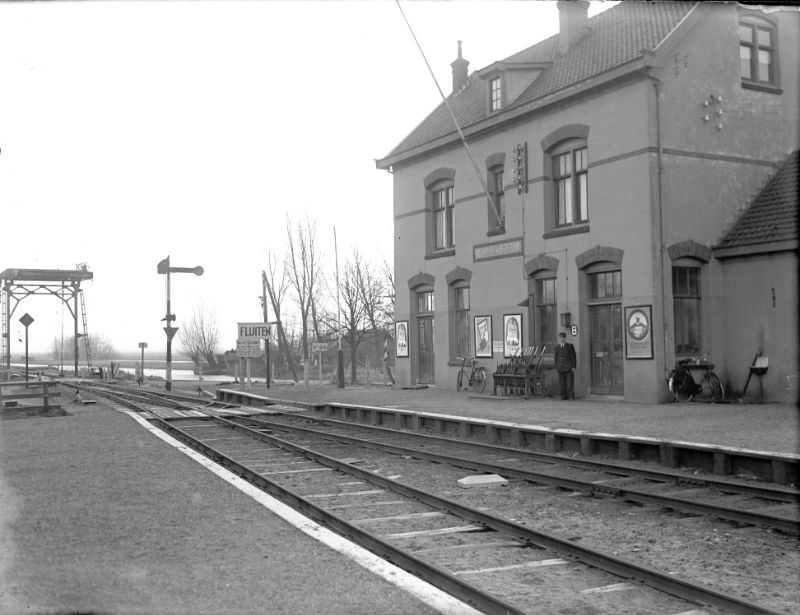 #17 Vinkeveen station with the station master annex signal box keeper stood a bit stiffly in front of the door of his Post B, February 22, 1950