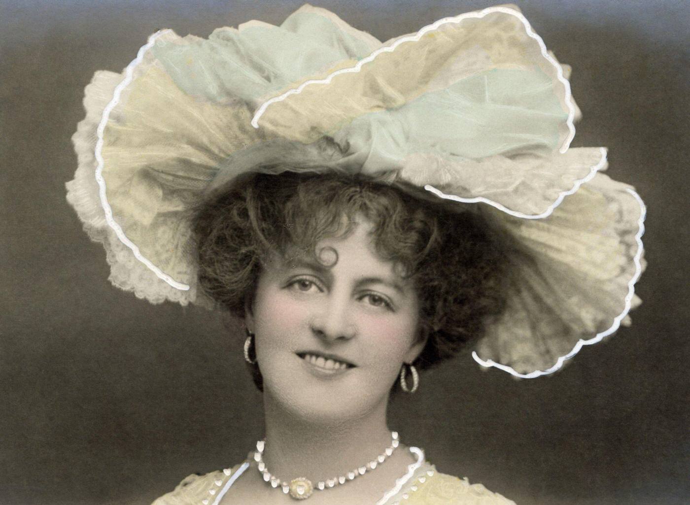 #33 Marie Studholme, a renowned English actress and singer, looks stunning in her splendid hat