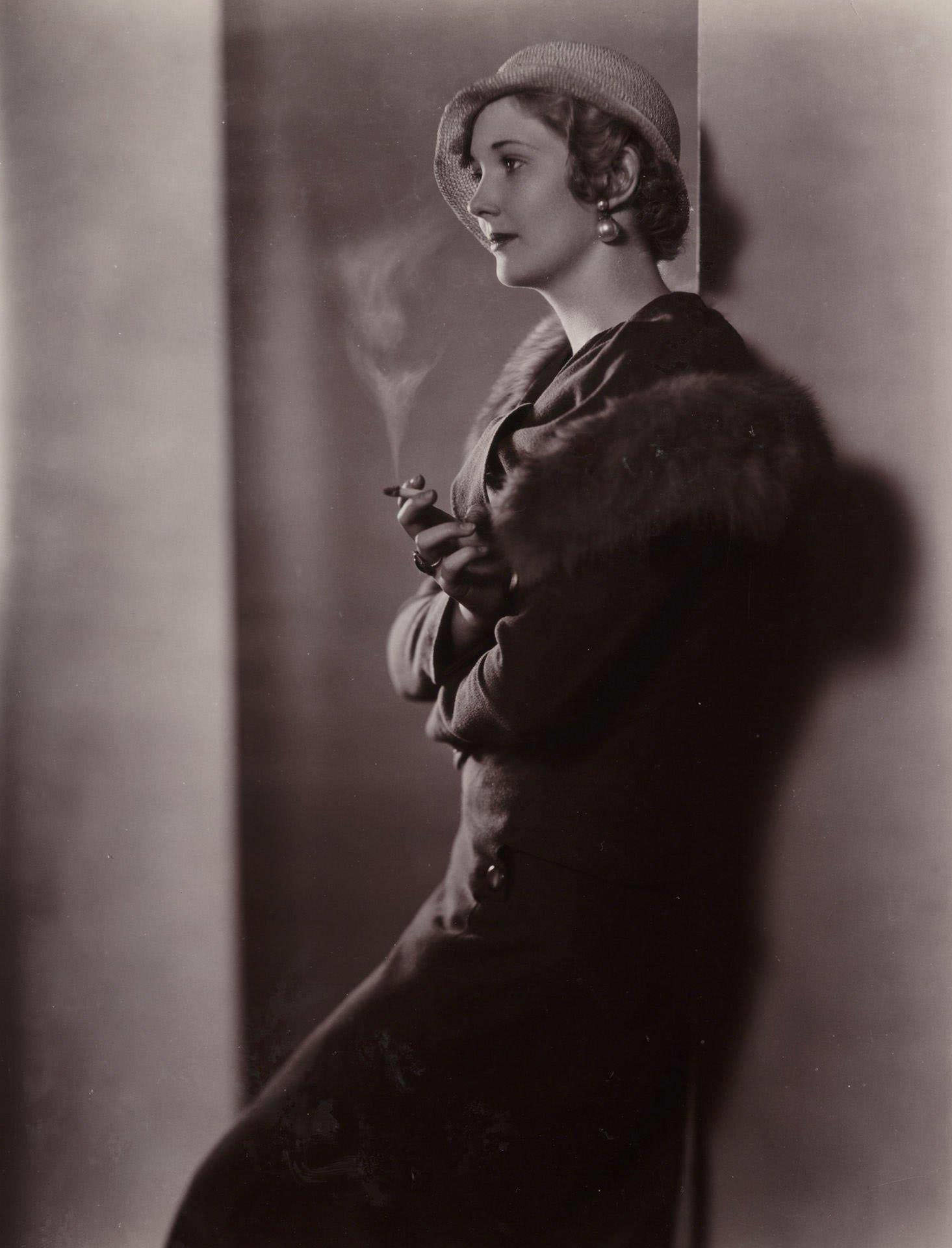 #43 An Edwardian woman smokes a cigarette in this portrait from the 1900s
