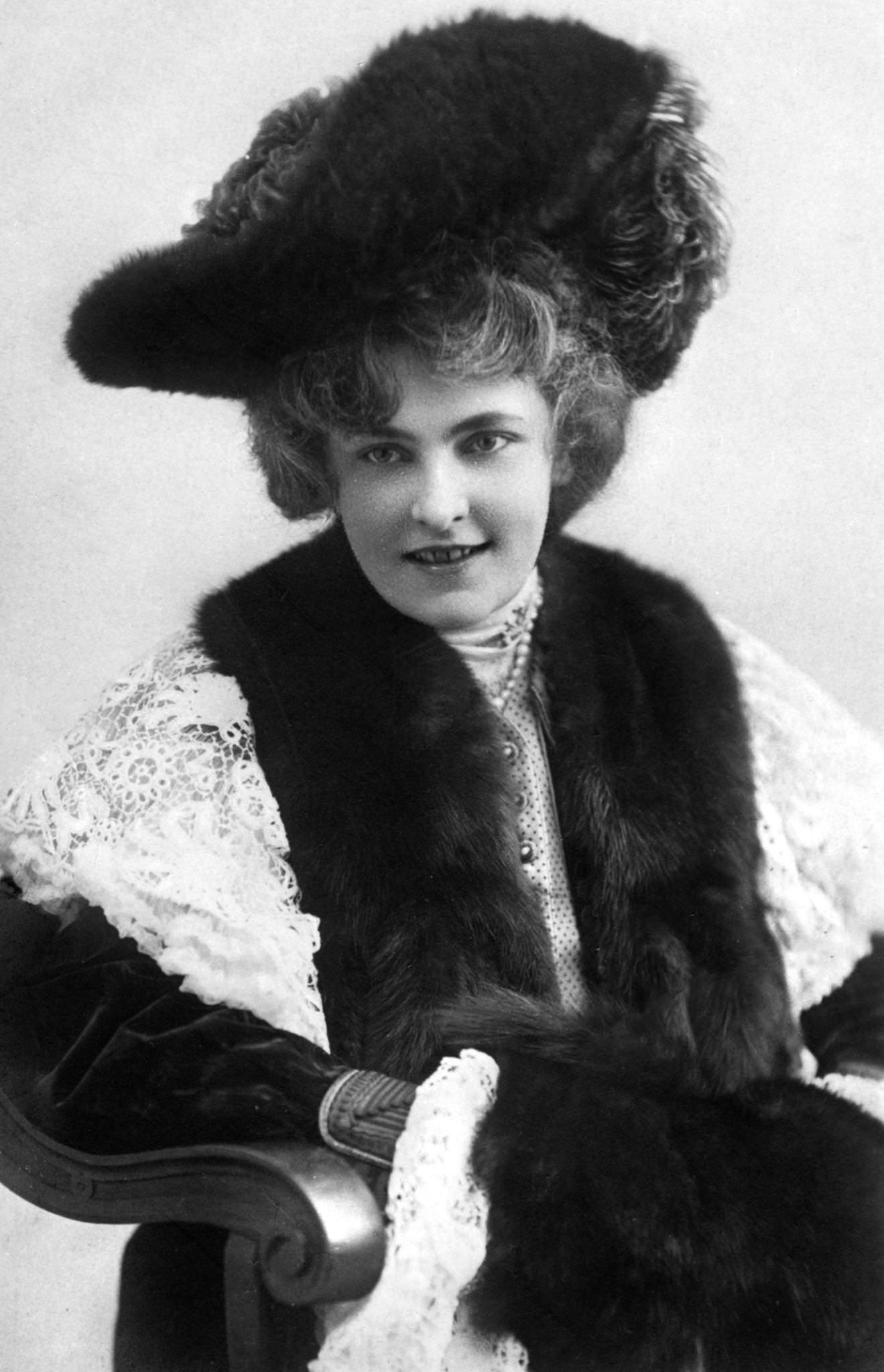 #19 Marie Studholme poses elegantly in a stunning hat