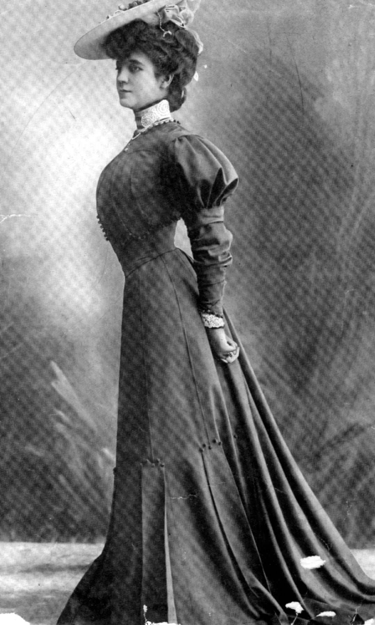 #46 An Edwardian woman models a street dress in the typical style of the period in 1905