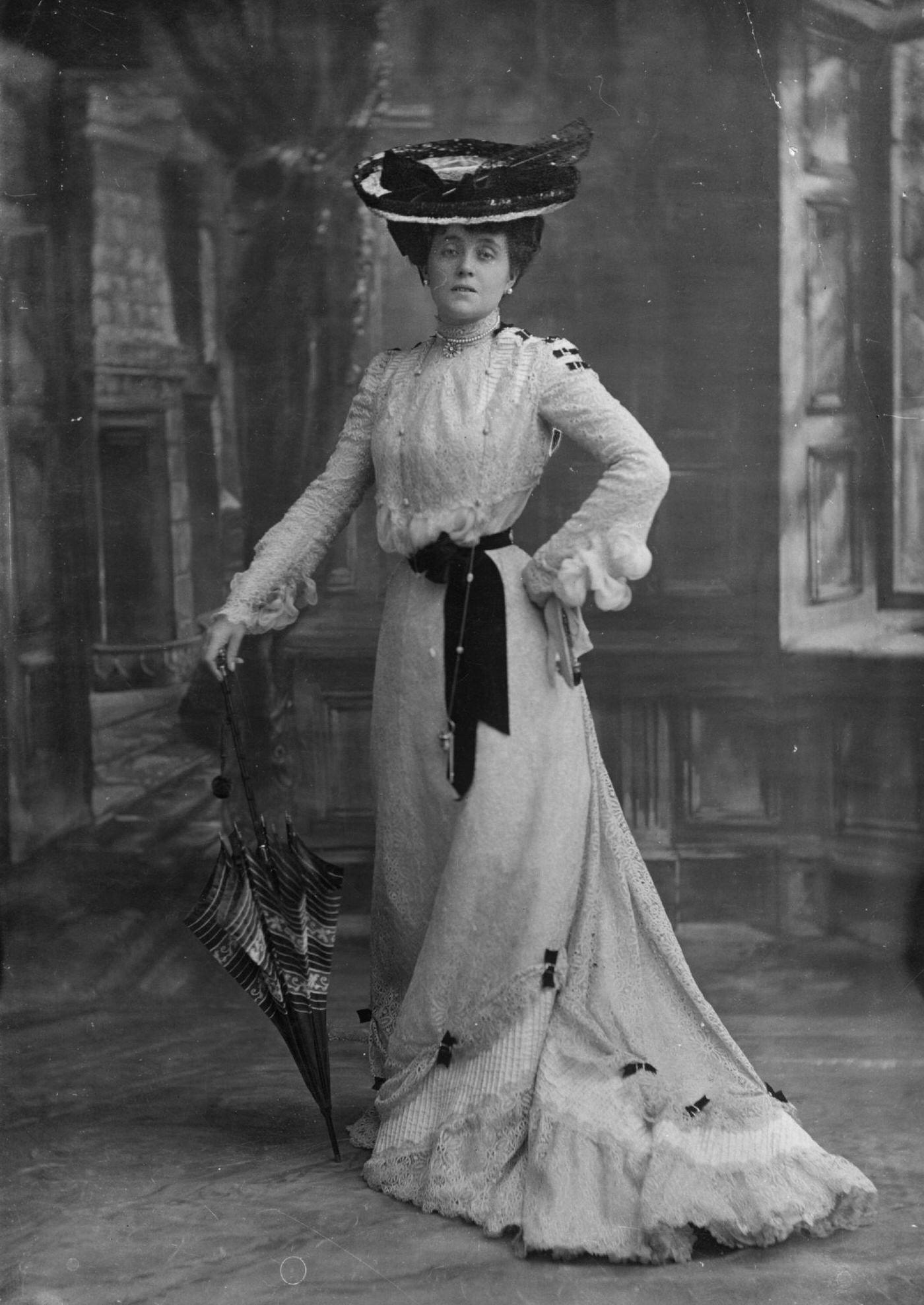 #3 An Edwardian lady poses with a parasol in a timeless portrait