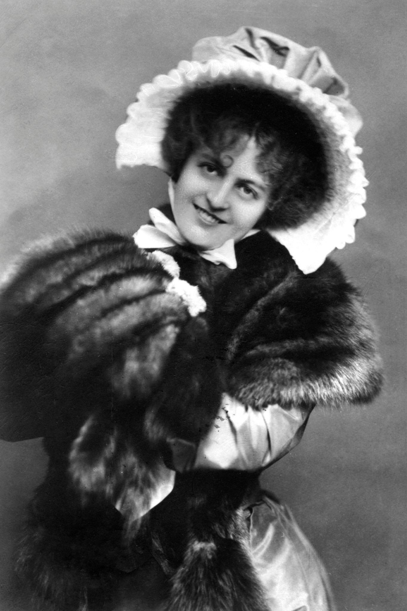 #21 Marie Studholme exudes grace and style in her chic hat
