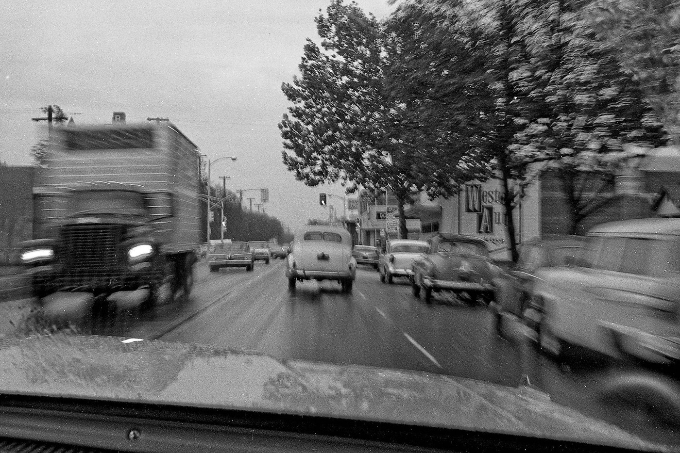 #15 A college friend while approaching the Barton intersection west bound on Tulare near Roosevelt High School in Fresno, California, in 1966..