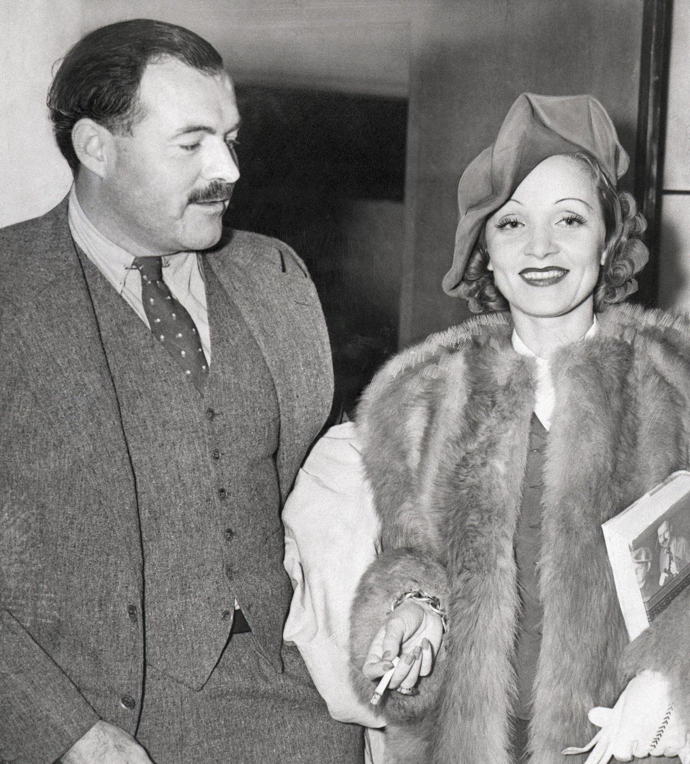 #20 Ernest Hemingway and Marlene Dietrich captured in a photograph together.