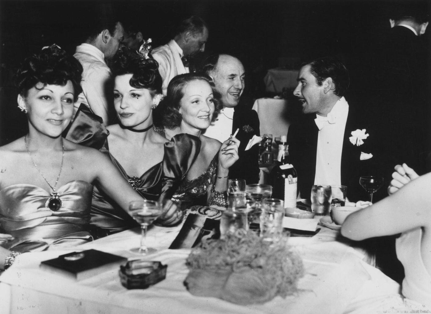 #27 Errol Flynn, Maria Magdalena von Losch, Lili Damita, and Jack Warner are pictured with Marlene Dietrich.