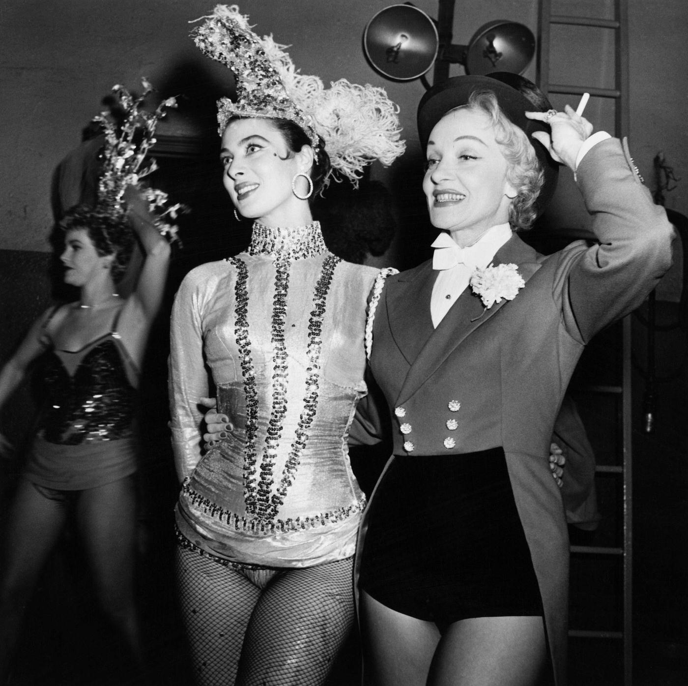 #36 Rita Gam and Marlene Dietrich perform at the opening of a circus in New York City in 1952.