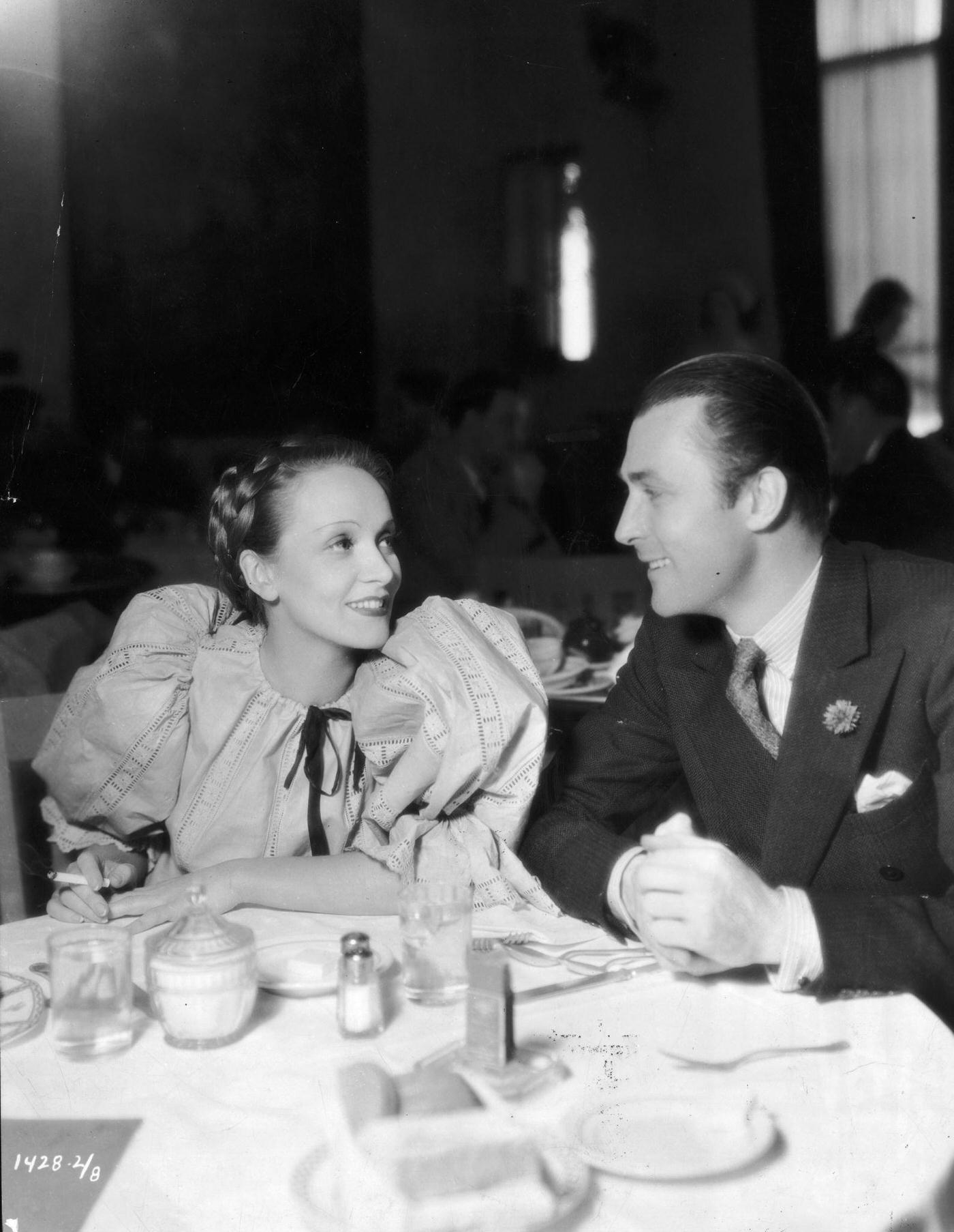 #53 Marlene Dietrich and Brian Aherne share a dinner scene from the film ‘Song Of Songs.’