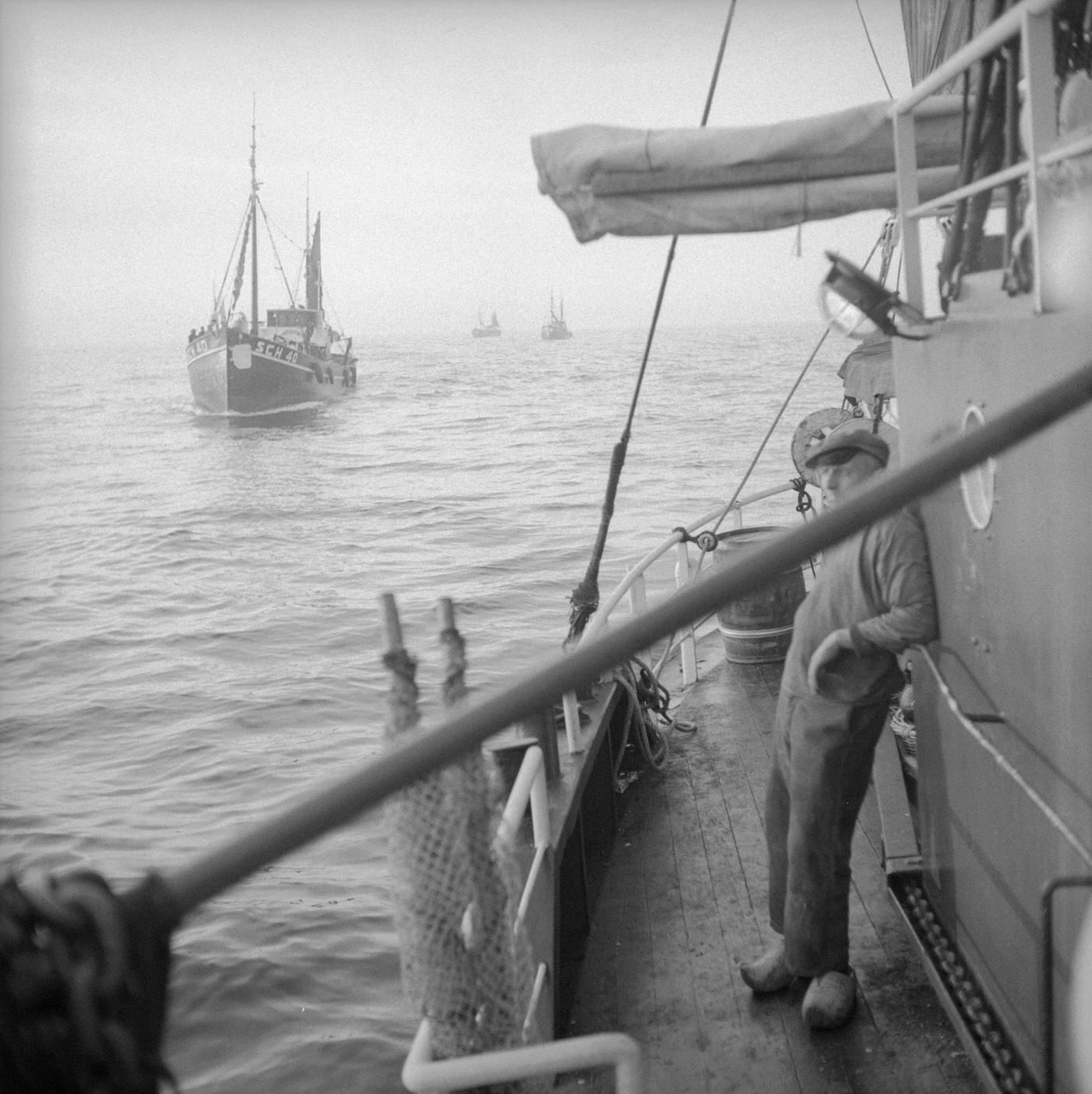 #25 Dutch herring fishermen on the North Sea, 1954.