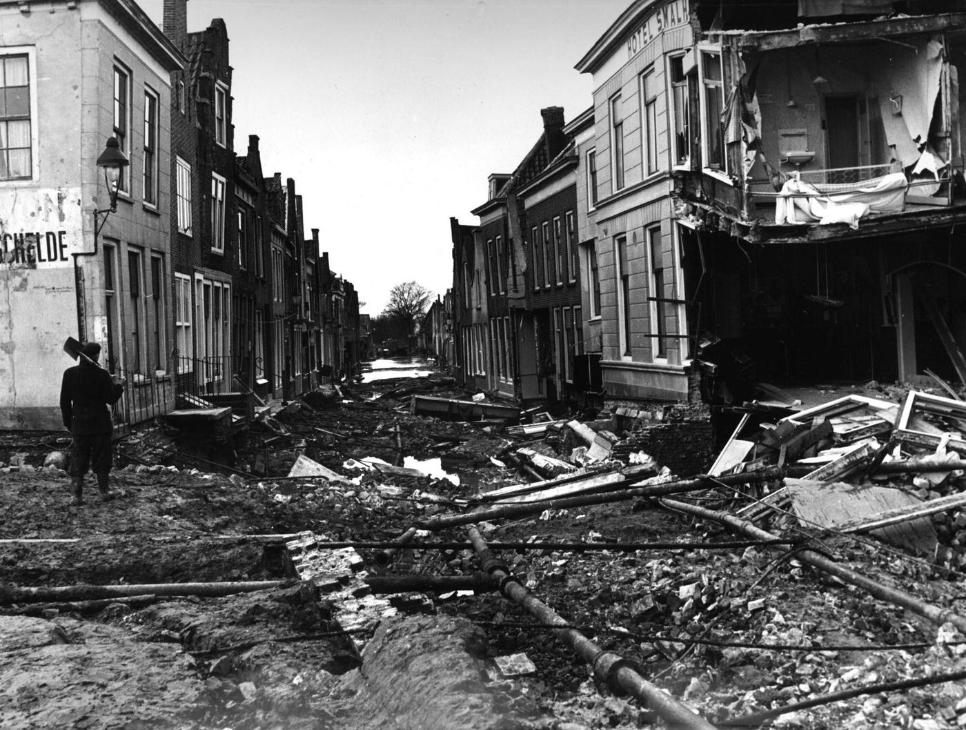 #34 A town destroyed by a flood in the Netherlands, February 1953.