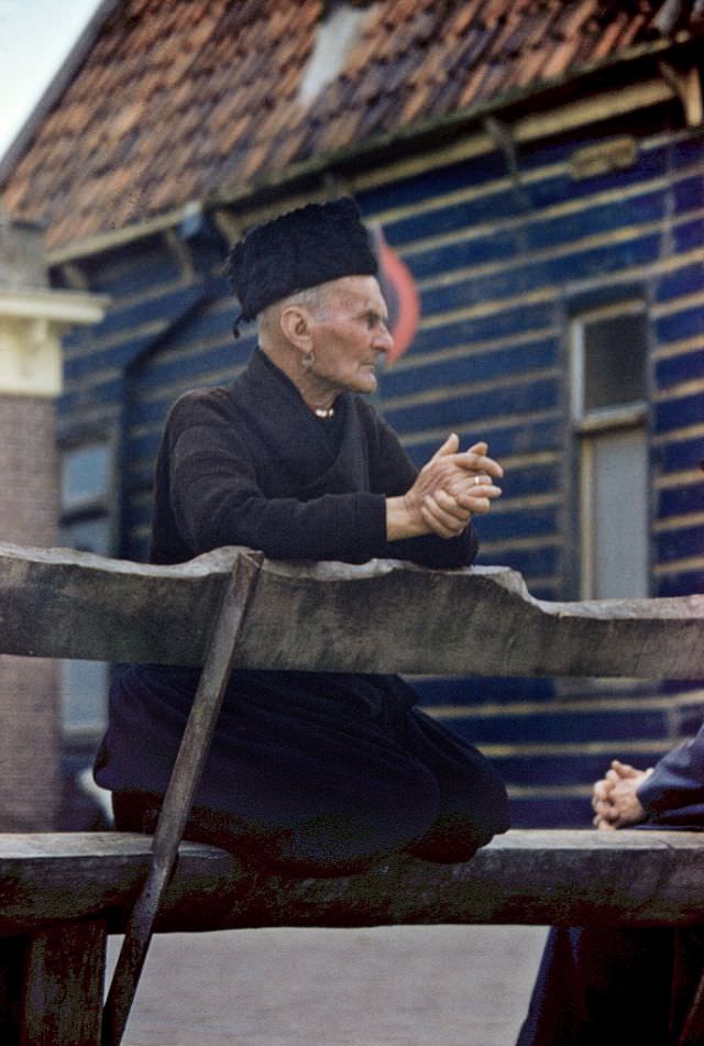#72 Man in traditional clothing and with a golden earring, Volendam.