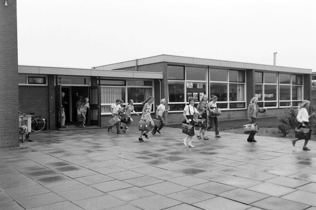 #120 Pupils leaving a secondary modern school at Lelystad in the Flevoland province, The Netherlands in 1971
