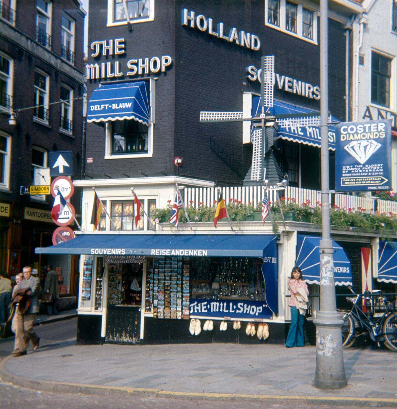#30 A vintage circa 1972 photograph of The Mill Shop – Holland Souvenirs, located at Rokin 123 in Amsterdam, The Netherlands, near the Oude Turfmarkt (Old Peat Market).