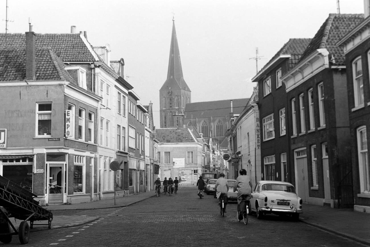 #7 Pedestrians on a street overlooking the Nikolauskirche in Kampen, The Netherlands, in 1971.