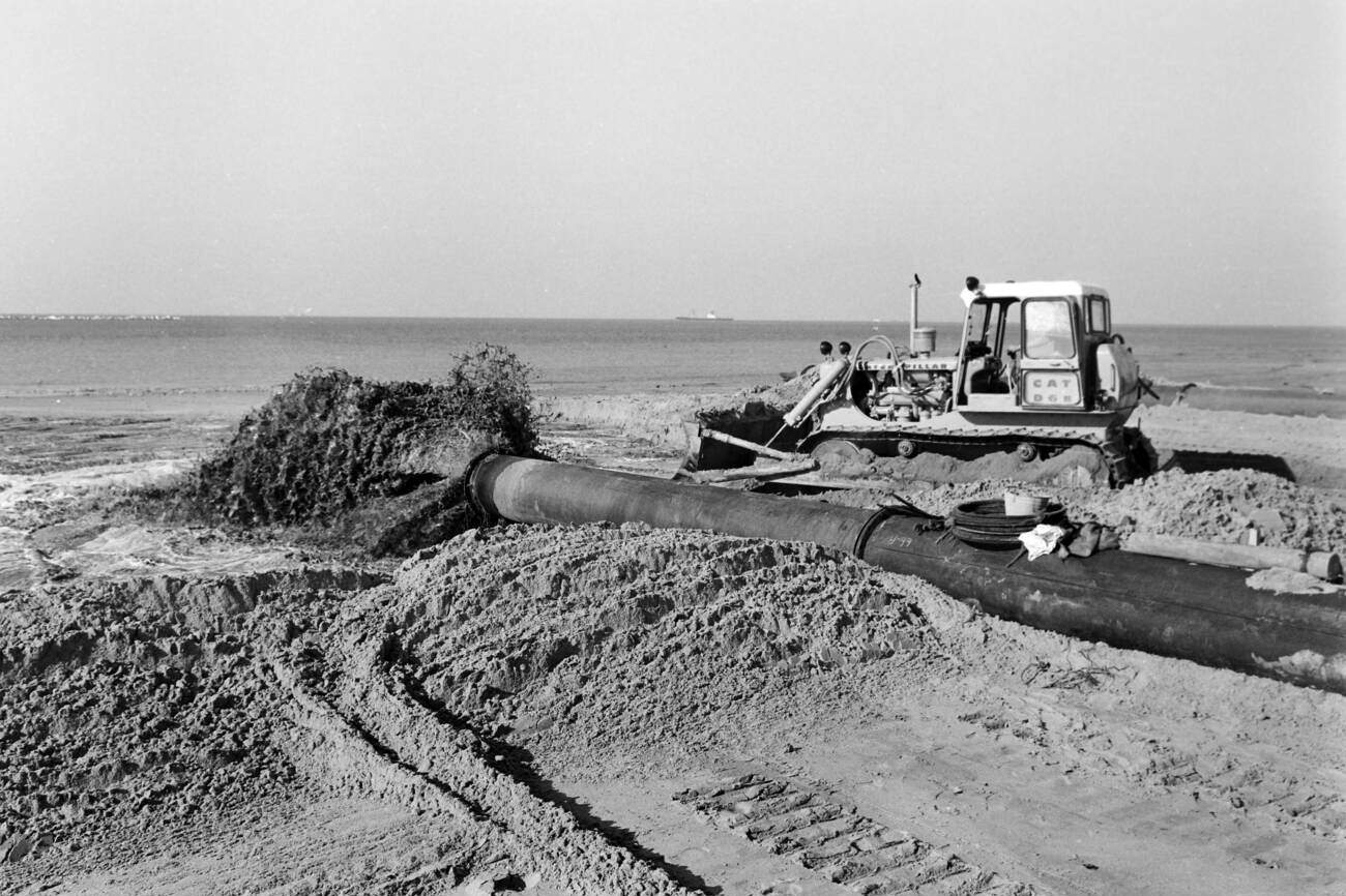 #8 Land reclamation by earth filling in the coastal area of Rotterdam, The Netherlands, in 1971.