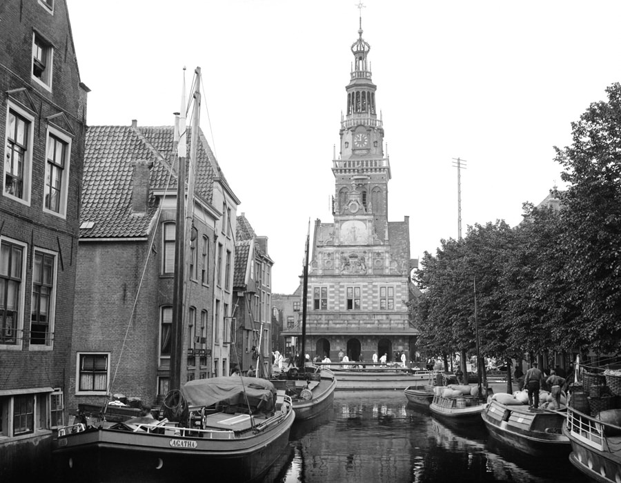 #112 Canal and cheese market in Alkmaar. Alkmaar is noted for its open-air cheese market, barely visible on the plaza ahead.