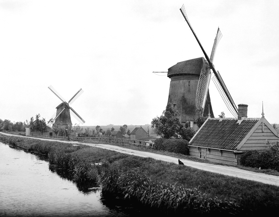 #114 Two windmills along a canal in Landsmeer.