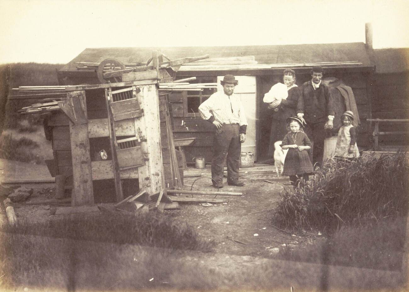 #93 Residents of a wooden house in Amsterdam, The Netherlands, 1900s