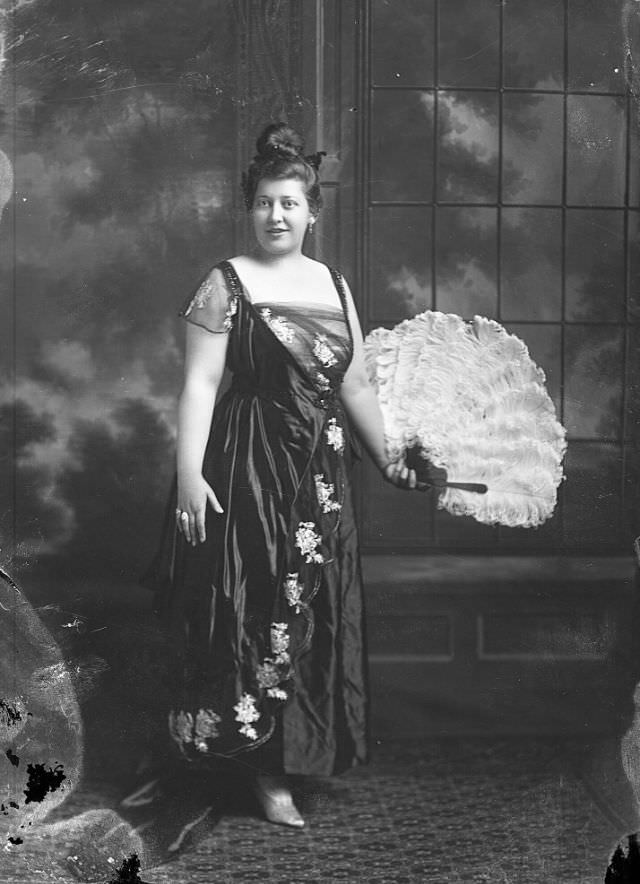 #6 Portrait of a woman holding feather fan, 1905
