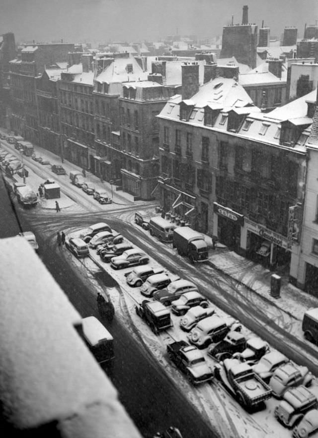 #10 Snow-covered cars, 1952.