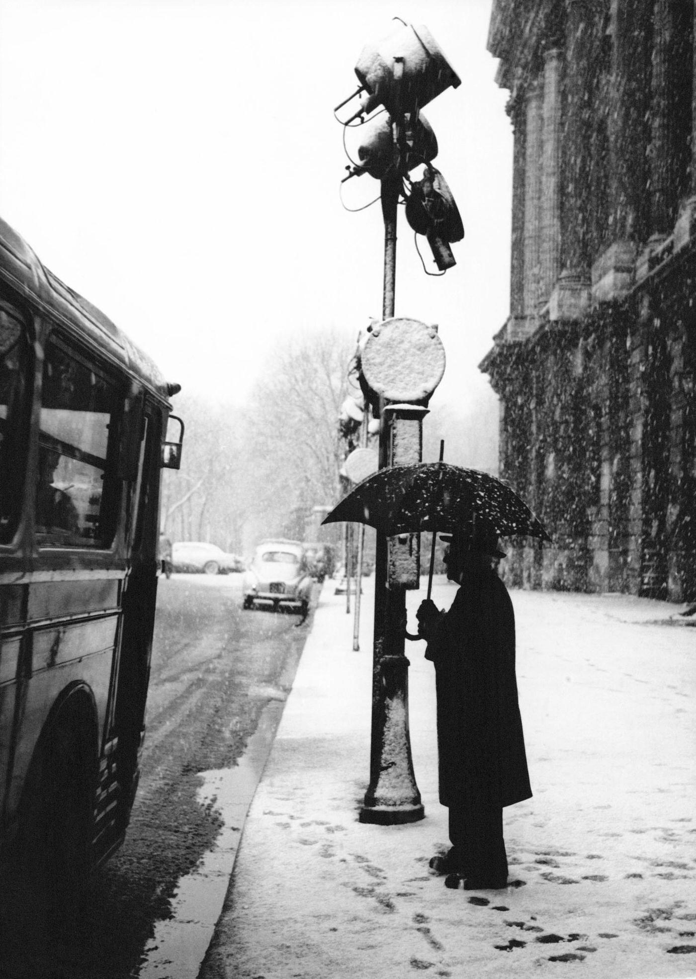 #50 Parisian Waiting For Bus Under Snow, Place de la Concorde, Paris, February 22, 1957.