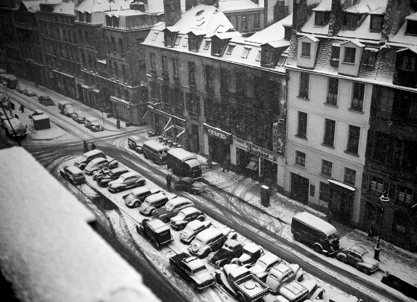 #53 People Walking In The Muddy Snow In Paris During The 1952 Winter.