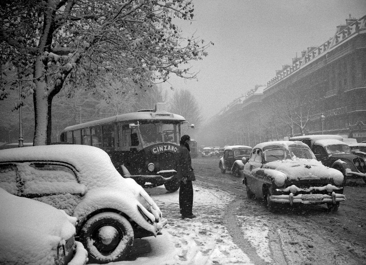 #55 People Walking In The Muddy Snow In Paris During The 1952 Winter.