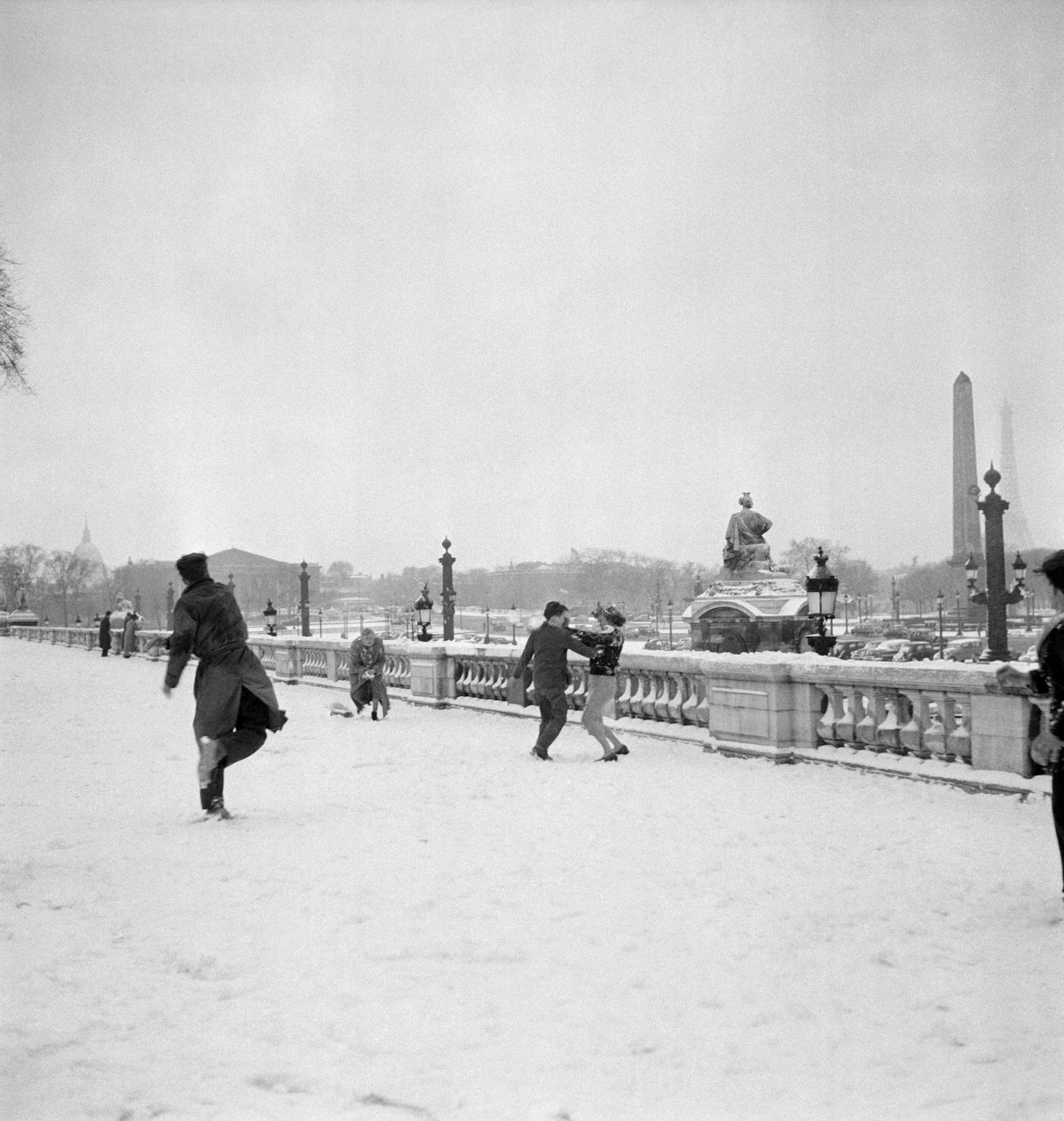 #58 Young Parisians Having A Snowball Fight At Place de la Concorde, Paris, January 1956.