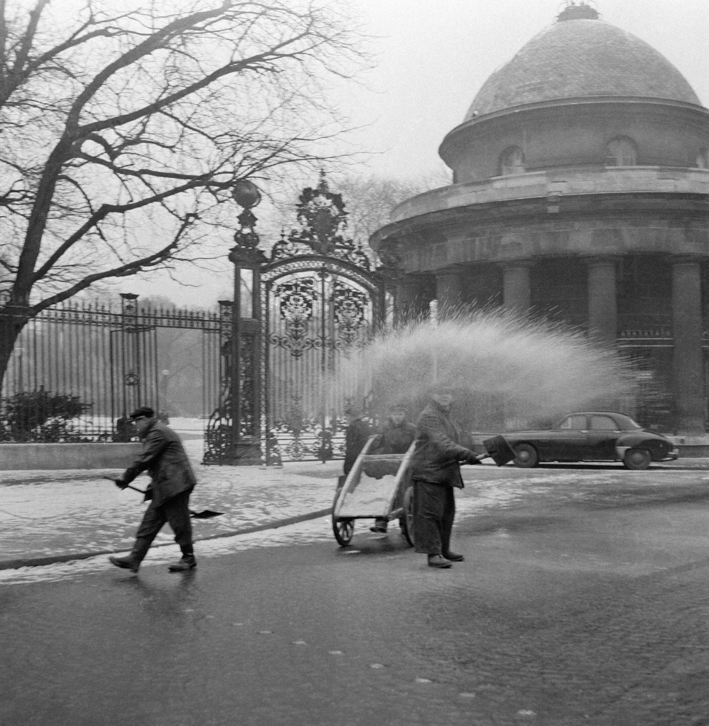 #68 City Workers Spreading Salt To Melt The Snow, Paris, February 23, 1956.