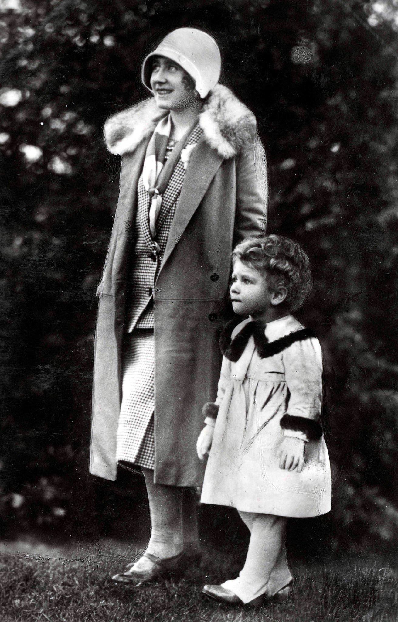#12 British Royalty, The Queen Mother pictured when she was the Duchess of York with her daughter Princess Elizabeth (later Queen Elizabeth II), 1928.