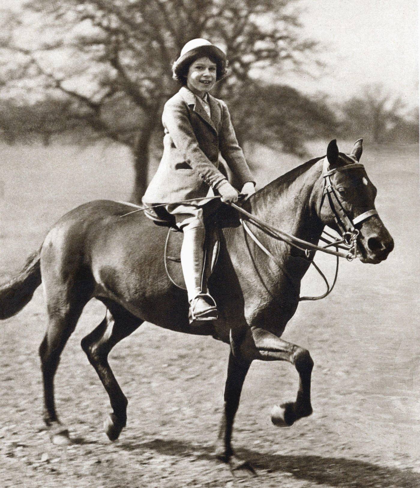 #21 Princess Elizabeth riding her pony in Windsor Great Park, 1930s.